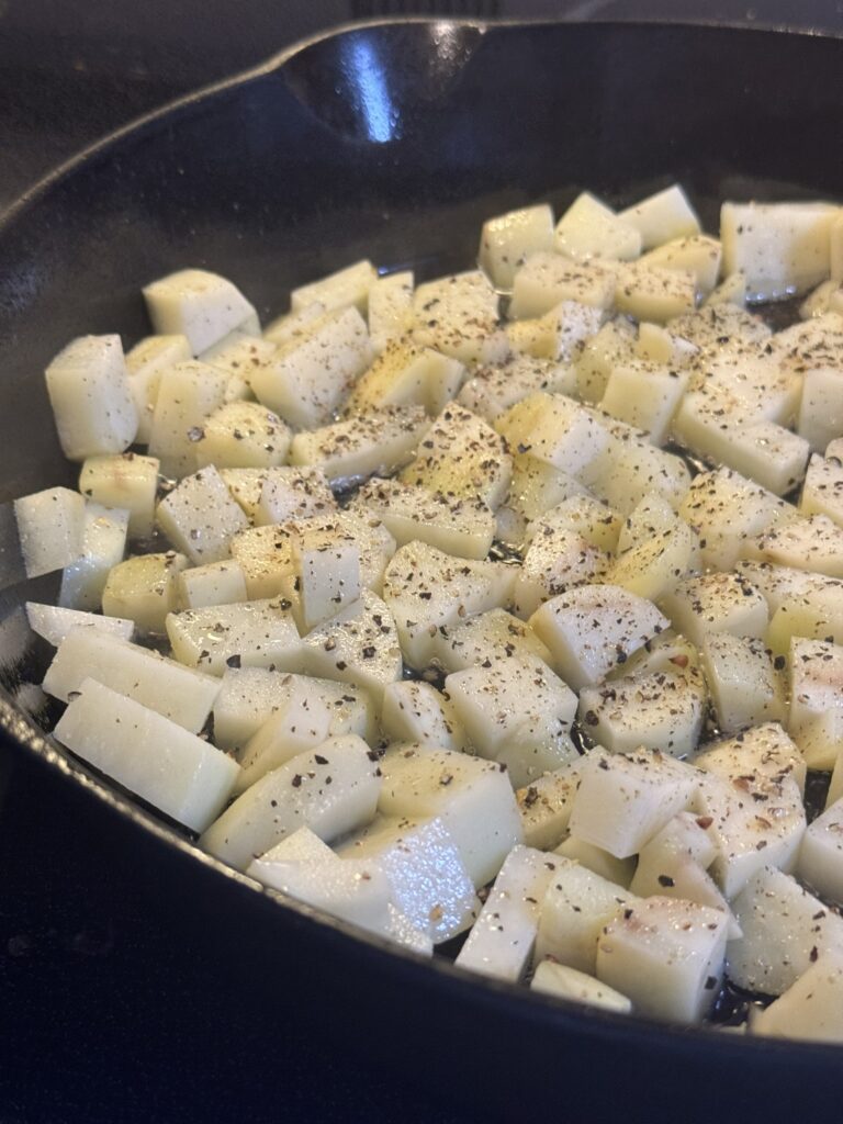 beef tallow potatoes in a cast iron skillet