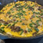 leftover steak frittata in a cast iron pan